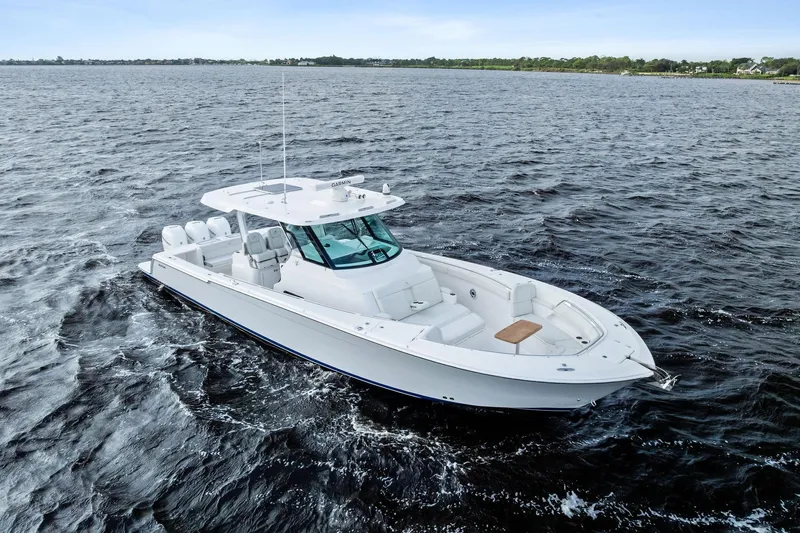 Isla Yacht Photos Pics 2022 Bertram 39 CC boat cruising on open water.