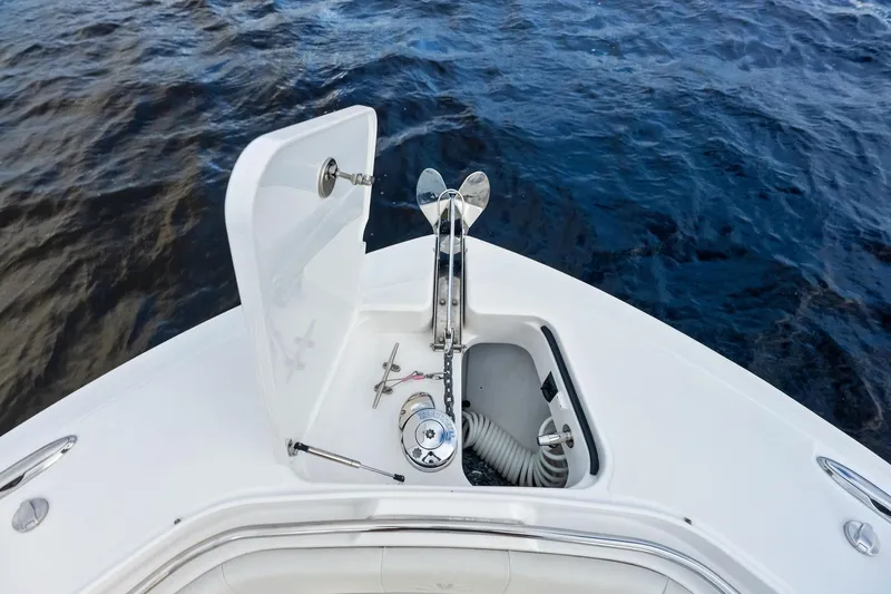 Isla Yacht Photos Pics Bow of 2022 Bertram 39 CC boat with anchor and storage compartment.