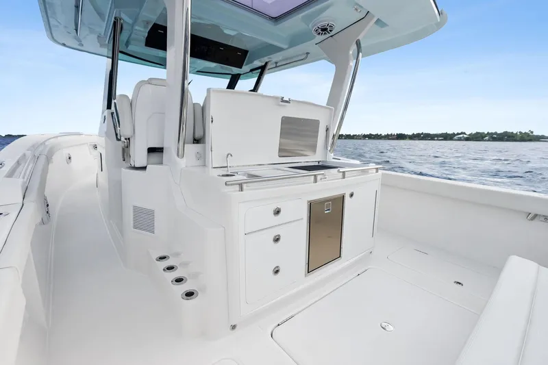 Isla Yacht Photos Pics 2022 Bertram 39 CC boat interior with sleek design and modern amenities on open water.