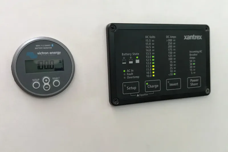 Oasis Yacht Photos Pics Victron Energy and Xantrex battery monitors on a 1987 Wilbur 38 boat.