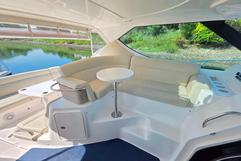 Living Benefit Yacht Photos Pics Luxurious interior of 2007 Tiara Yachts 3900 Sovran with elegant seating and scenic view.