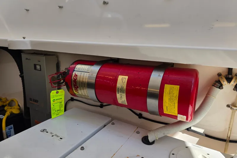 Living Benefit Yacht Photos Pics Fire extinguisher in 2007 Tiara Yachts 3900 Sovran engine compartment.