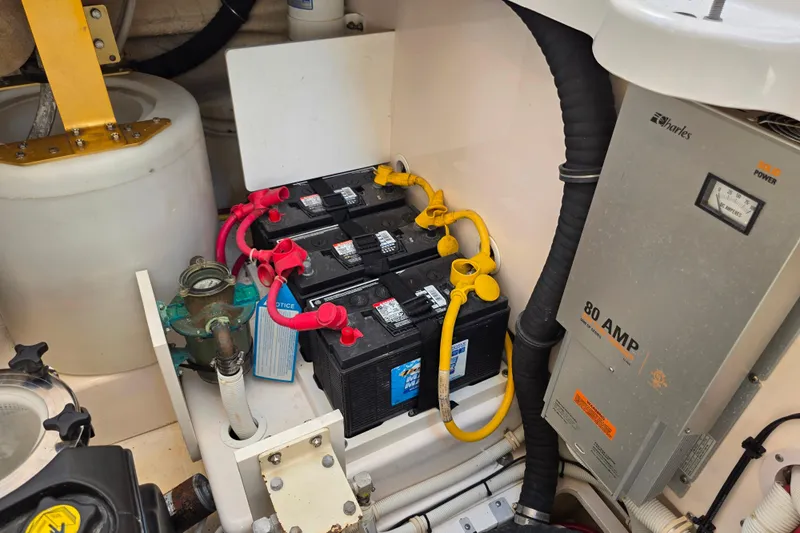 Living Benefit Yacht Photos Pics Engine room of 2007 Tiara Yachts 3900 Sovran with batteries and 80 AMP charger.