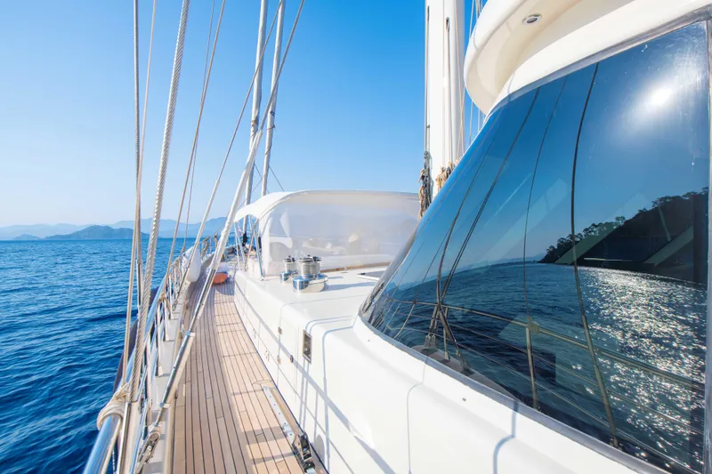 Ns02282 Yacht Photos Pics Custom Motorsailer 41M, 2023 model, sailing on clear blue waters under a bright sky.