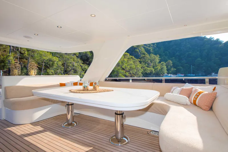 Ns02282 Yacht Photos Pics Luxurious 2023 Custom Motorsailer 41M yacht interior with elegant seating and scenic views.