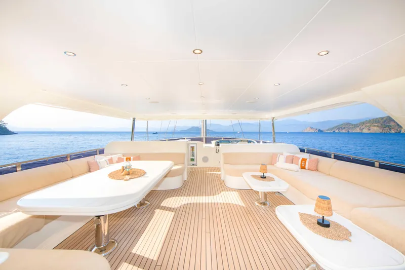 Ns02282 Yacht Photos Pics Luxurious 2023 Custom Motorsailer 41M yacht deck with elegant seating and ocean view.