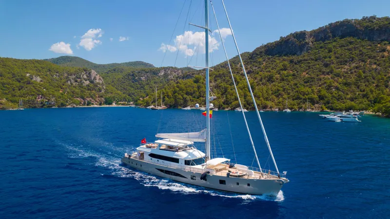 Ns02282 Yacht Photos Pics Custom Motorsailer 41M yacht sailing in a scenic bay, 2023 model.