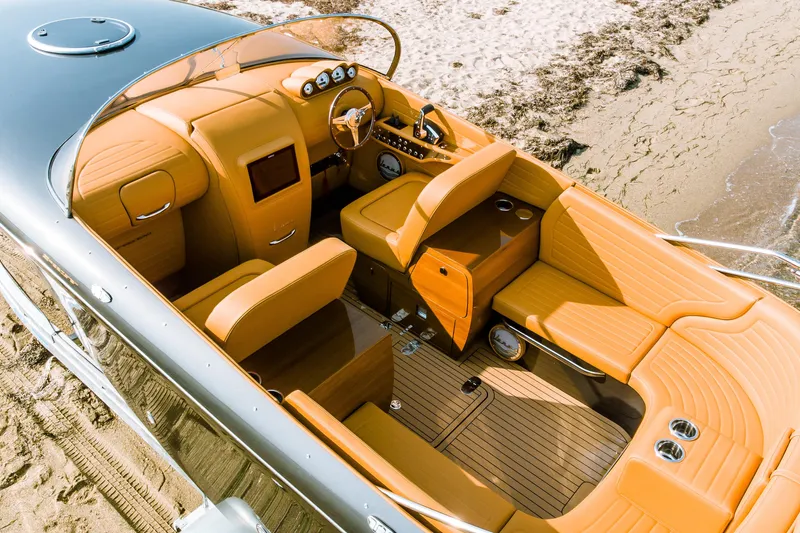 Seven Seas Speedster X Yacht Photos Pics Luxurious 2025 Seven Seas Yachts Venus Speedster X with elegant tan interior on sandy beach.