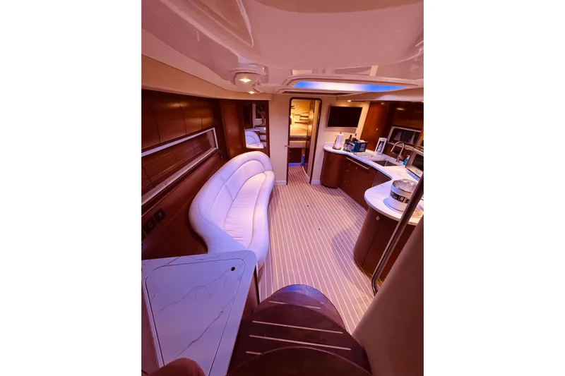 Lilley Pad Yacht Photos Pics Luxurious interior of 2007 Sea Ray 44 Sundancer yacht with elegant seating and modern amenities.