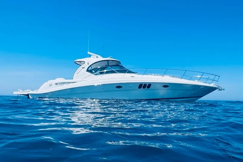 Lilley Pad Yacht Photos Pics 2007 Sea Ray 44 Sundancer yacht cruising on open blue ocean.