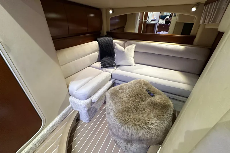 Lilley Pad Yacht Photos Pics Luxurious interior of 2007 Sea Ray 44 Sundancer yacht with plush seating and elegant decor.