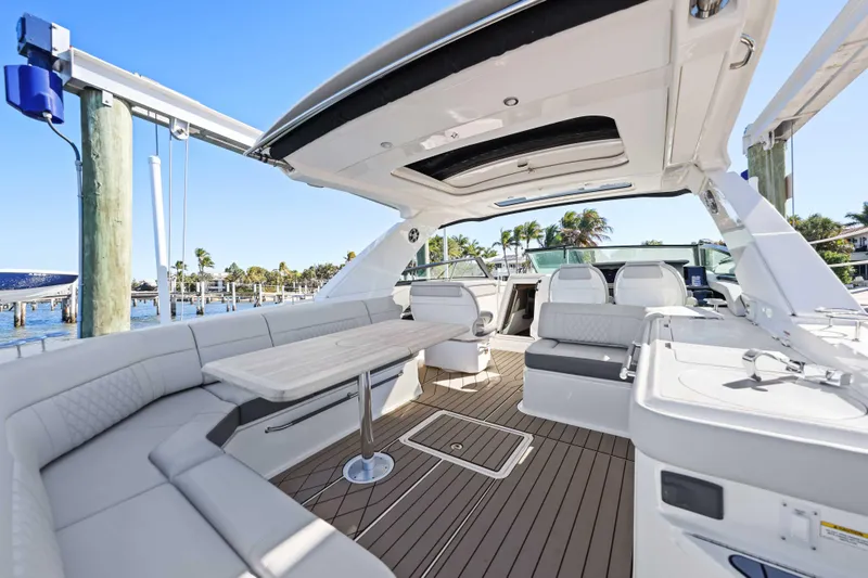  Yacht Photos Pics 2023 Sea Ray SLX 400 Outboard luxury boat interior with spacious seating and elegant design.