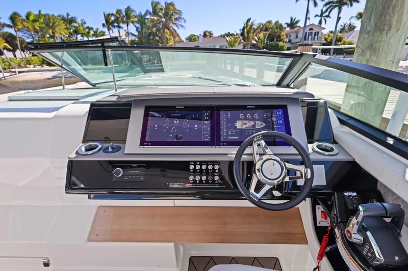  Yacht Photos Pics 2023 Sea Ray SLX 400 Outboard helm with modern controls and digital displays.