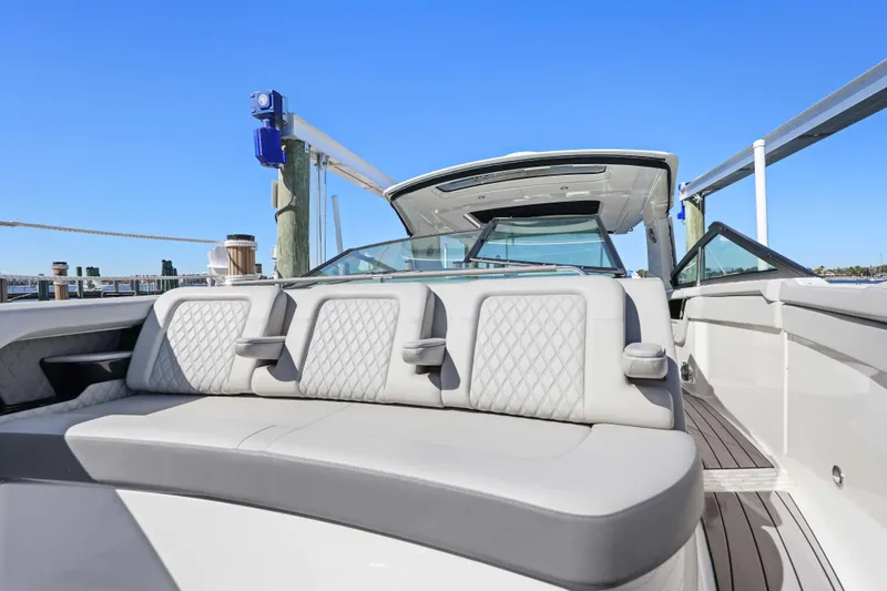  Yacht Photos Pics 2023 Sea Ray SLX 400 Outboard luxury boat interior with plush seating.