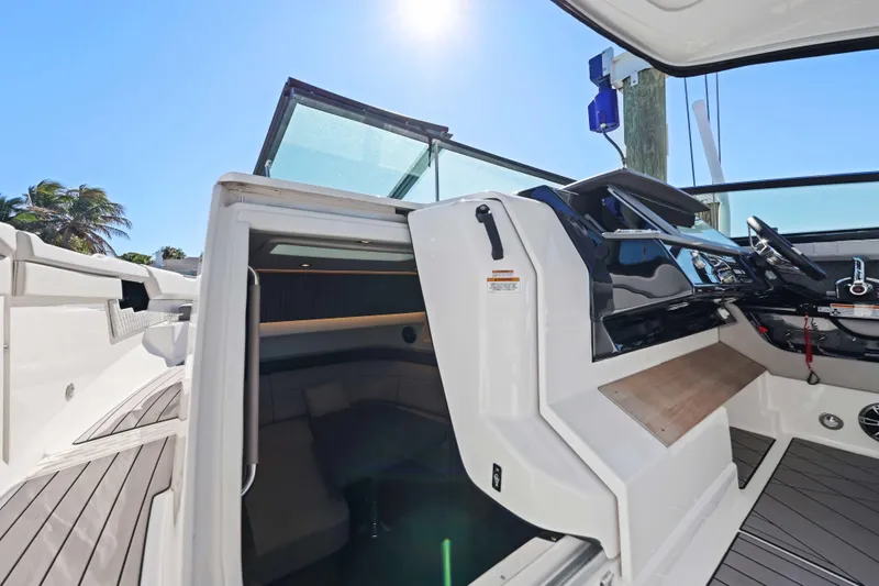  Yacht Photos Pics 2023 Sea Ray SLX 400 Outboard cockpit with open cabin and modern helm.