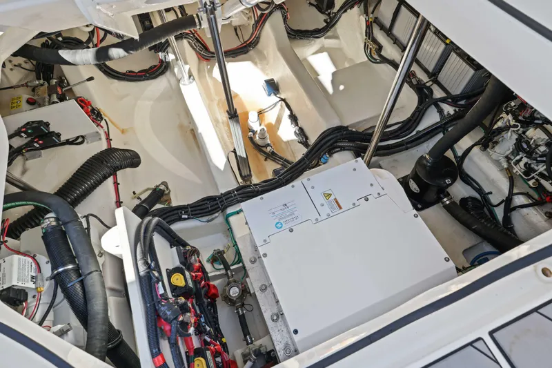  Yacht Photos Pics Engine compartment of 2023 Sea Ray SLX 400 Outboard, showcasing wiring and components.