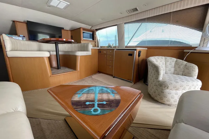 Reel It In Yacht Photos Pics Luxurious interior of 2003 Ocean Yachts 40 Super Sport with elegant seating and decor.