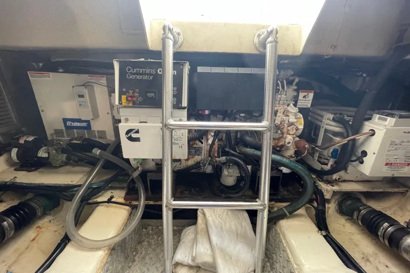 Reel It In Yacht Photos Pics Engine room of 2003 Ocean Yachts 40 Super Sport with Cummins generator and equipment.