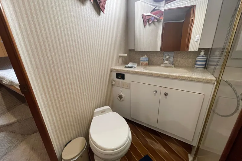 Reel It In Yacht Photos Pics Bathroom interior of 2003 Ocean Yachts 40 Super Sport with toilet and vanity.