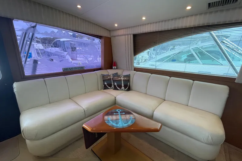 Reel It In Yacht Photos Pics Luxurious interior of 2003 Ocean Yachts 40 Super Sport with white leather seating.