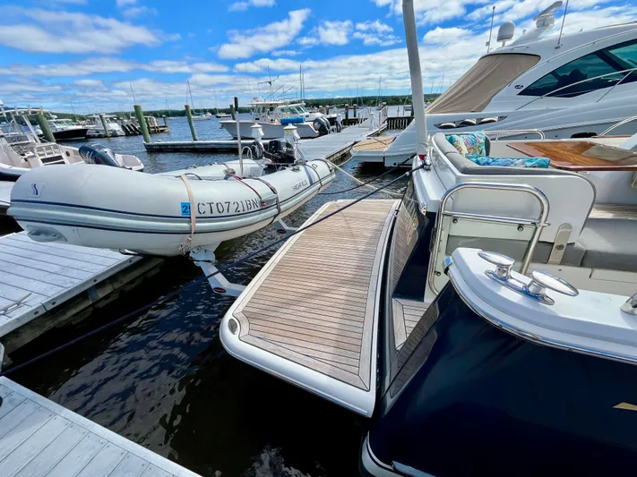 Calamity Jane Yacht Photos Pics 2018 Sabre 45 Salon Express yacht docked with inflatable boat.