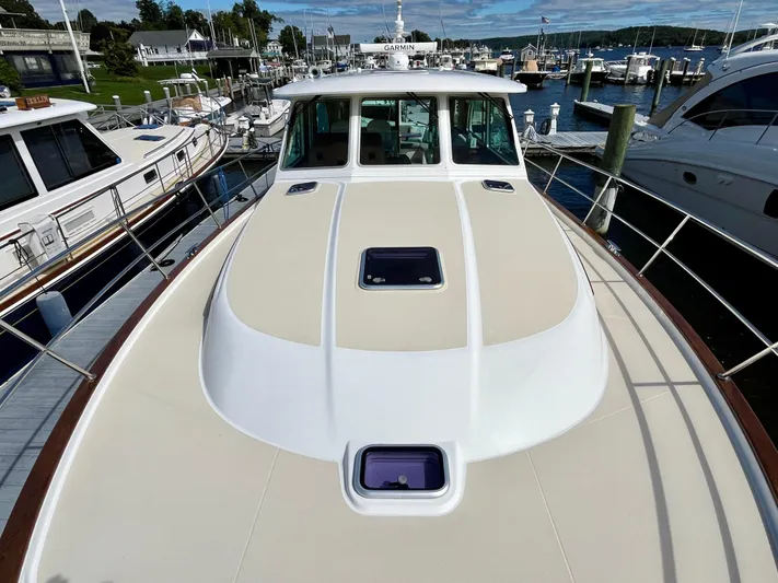 Calamity Jane Yacht Photos Pics 2018 Sabre 45 Salon Express yacht docked at marina, top deck view.