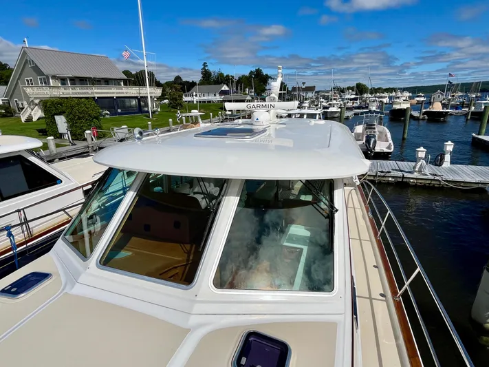 Calamity Jane Yacht Photos Pics 2018 Sabre 45 Salon Express docked at a scenic marina.