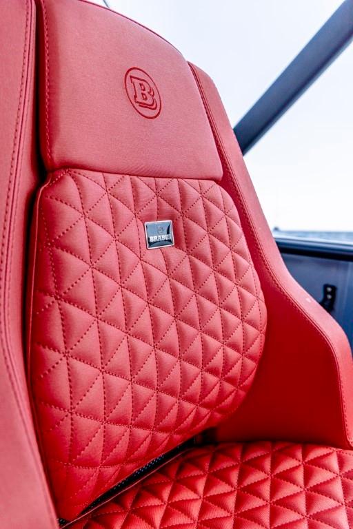 Red quilted seat of 2024 BRABUS SHADOW 300 CT with logo detailing.
