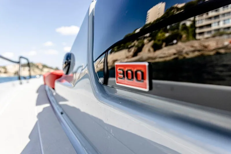  Yacht Photos Pics 2024 BRABUS SHADOW 300 CT boat with sleek design and red 300 emblem.