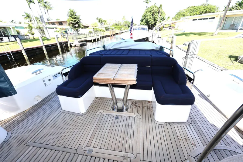  Yacht Photos Pics Luxurious 2016 Sunseeker Manhattan 55 yacht deck with seating and table.