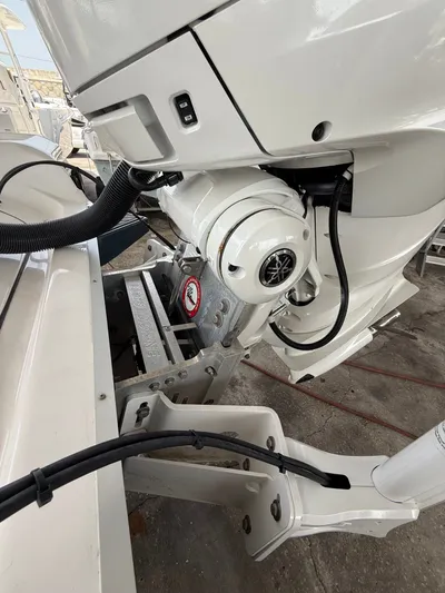  Yacht Photos Pics Close-up of 2022 Tidewater 2700 Carolina Bay boat engine components.