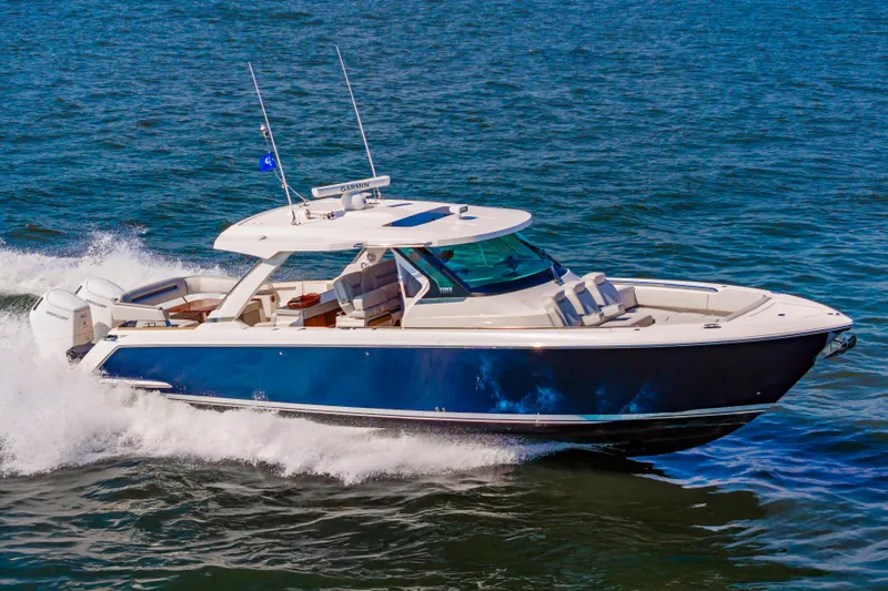 Always Saturday Yacht Photos Pics 2023 Tiara Yachts 43 LS cruising on open water, showcasing sleek design and powerful performance.