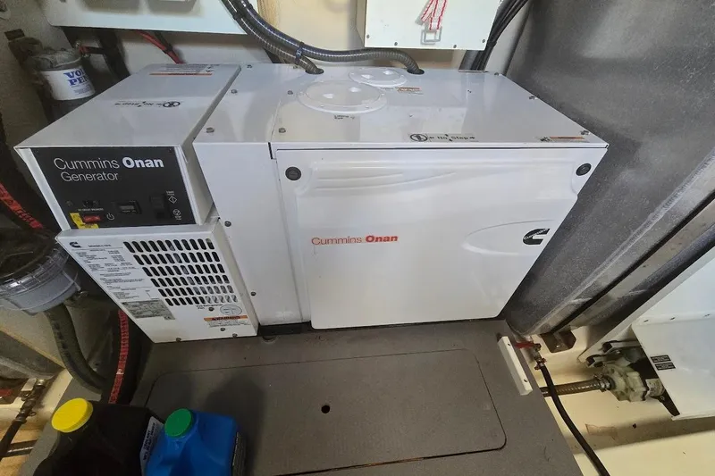 What A Day Yacht Photos Pics Cummins Onan generator in a 2013 Prestige 500 yacht engine room.