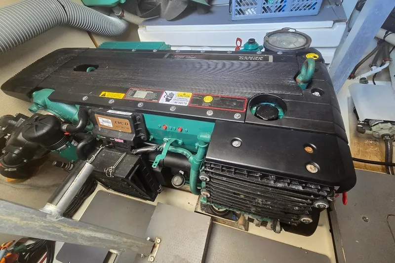 What A Day Yacht Photos Pics Engine compartment of a 2013 Prestige 500 yacht, showcasing mechanical components and wiring.