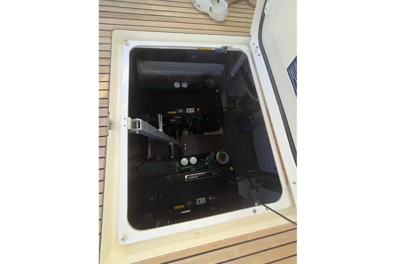 What A Day Yacht Photos Pics Engine compartment of a 2013 Prestige 500 yacht, showcasing dual engines.