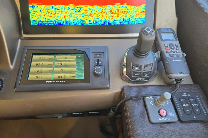 What A Day Yacht Photos Pics Control panel of a 2013 Prestige 500 yacht with navigation and thruster controls.