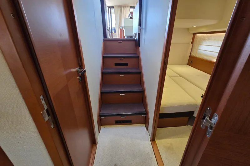 What A Day Yacht Photos Pics Interior of 2013 Prestige 500 yacht with stairs and cabin view.