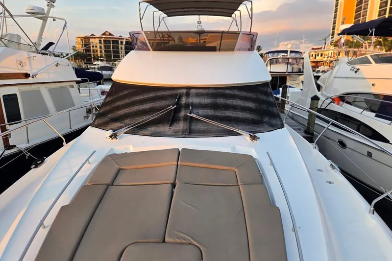 What A Day Yacht Photos Pics 2013 Prestige 500 yacht with sun deck, docked at marina during sunset.