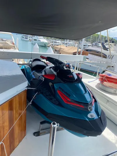 Demarest Yacht Photos Pics Jet ski on Falcon 106 yacht deck, 2002 model, docked at marina.