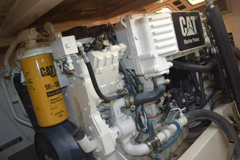 Never Again VII Yacht Photos Pics Engine room of 2006 Cabo 35 Express with CAT Marine Power engine.