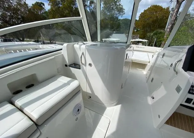 Wcn 51988 325dc Wht Mer350 Yacht Photos Pics 2024 World Cat 325 DC boat interior with white seating and modern design.