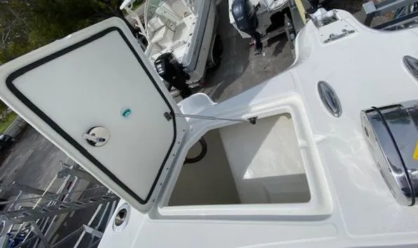 Wcn 51988 325dc Wht Mer350 Yacht Photos Pics 2024 World Cat 325 DC storage compartment with open hatch.