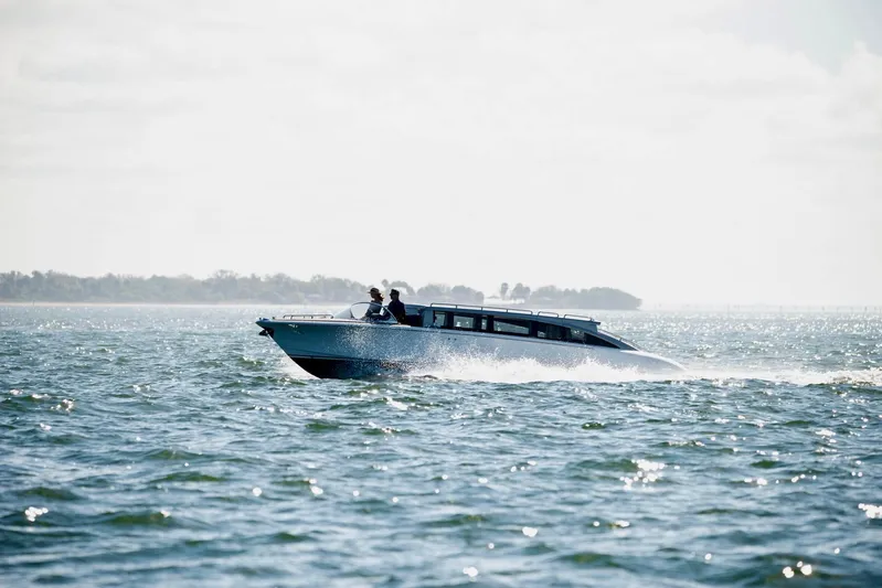  Yacht Photos Pics 2016 Hodgdon Venetian boat cruising on open water under a bright sky.