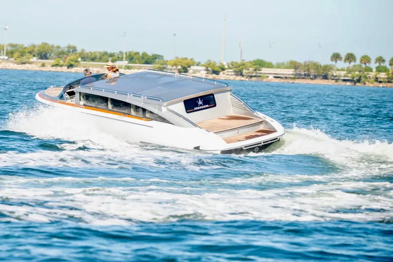  Yacht Photos Pics 2016 Hodgdon Venetian boat cruising on a sunny day in open water.