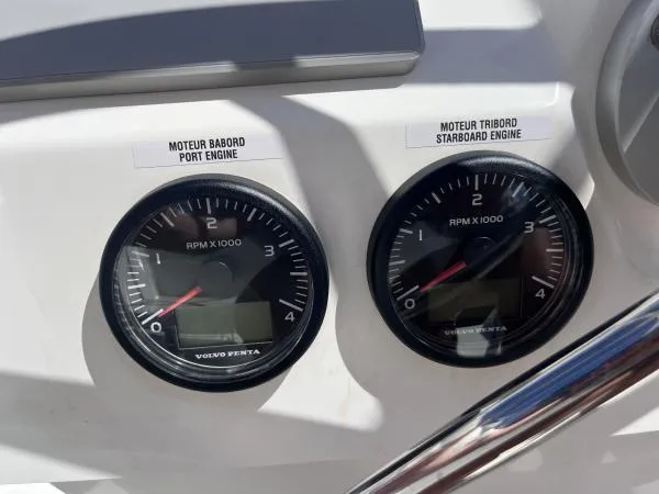 Sea The World Yacht Photos Pics RPM gauges for port and starboard engines on 2023 Fountaine Pajot Elba 45.