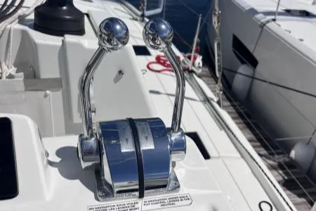 Sea The World Yacht Photos Pics Throttle controls on a 2023 Fountaine Pajot Elba 45 catamaran, docked at a marina.