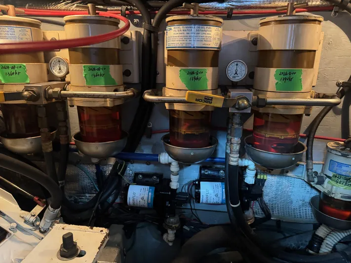  Yacht Photos Pics Engine room of 1998 Sea Ray 420 Aft Cabin with fuel filters and gauges.