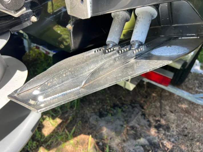  Yacht Photos Pics Trim tabs on a 2012 Hydra-Sports 3400 CC boat, close-up view.