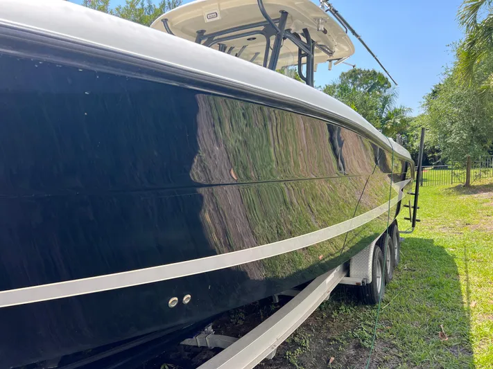  Yacht Photos Pics 2012 Hydra-Sports 3400 CC boat on trailer, side view, outdoors.