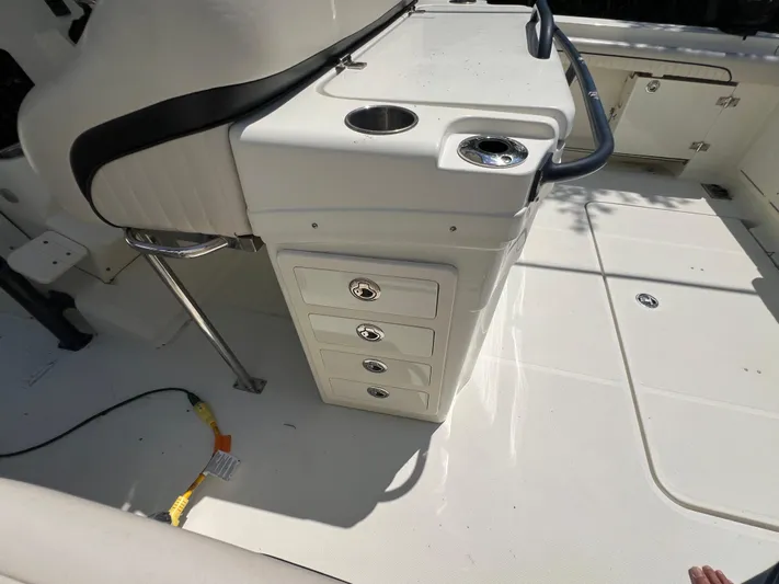  Yacht Photos Pics 2012 Hydra-Sports 3400 CC boat interior with storage drawers and seating.